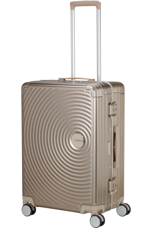 Mala de Viagem Média 68cm 4 Rodas em Alumínio Bronze - Soundbox Alu | American Tourister®